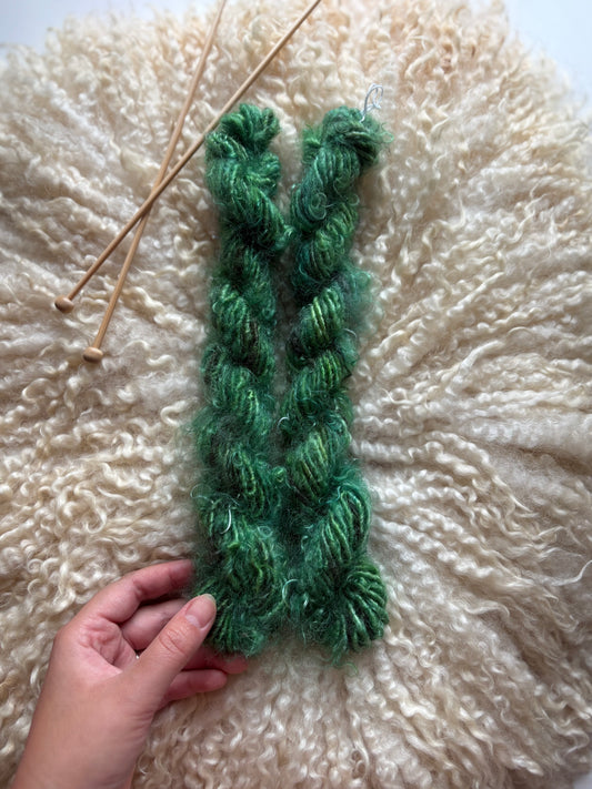 Single ply 100% yearling grade mohair coreless lock spun art yarn. Roughly 1.30oz 20 yards dyed from Castiel and Penelope SOFT